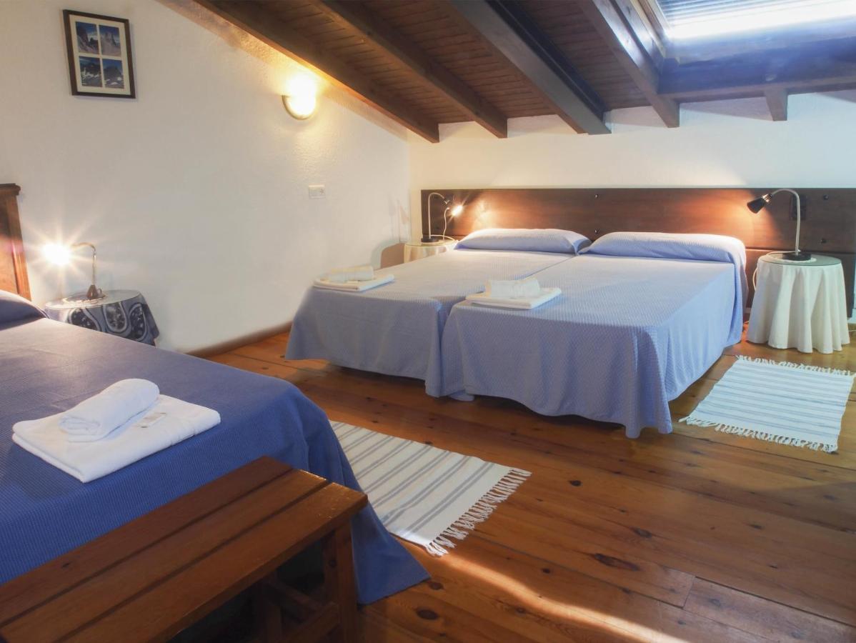 Casa de la Montaña Albergue Turístico Avín Habitación foto